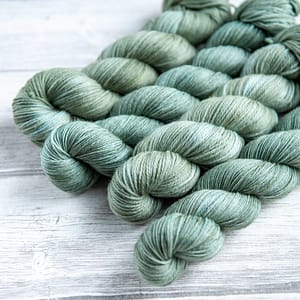 four skeins of yarn in the colorway 'Portree Harbour'