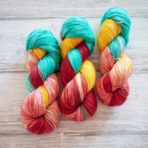 3 skeins of yarn in the colorway Roussillon