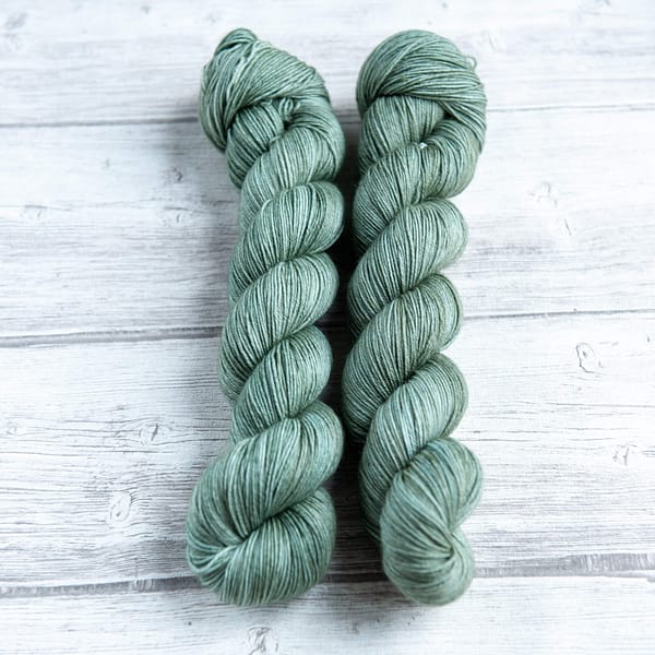 two skeins of yarn in the colorway 'Portree Harbour'