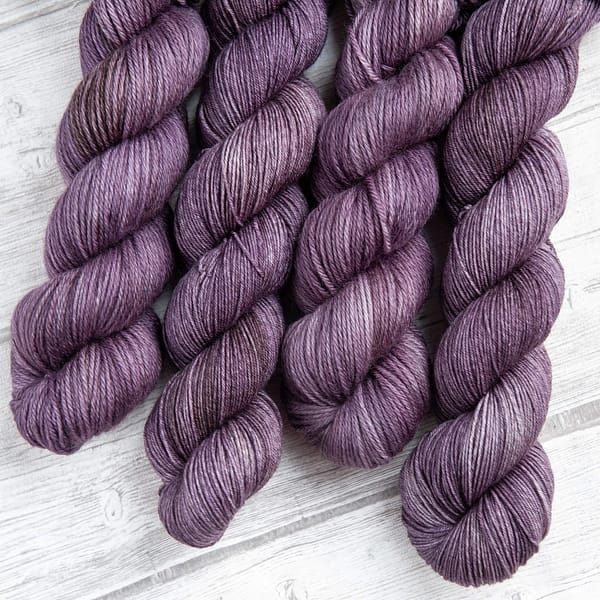four skeins of yarn in the colorway 'Thistle'