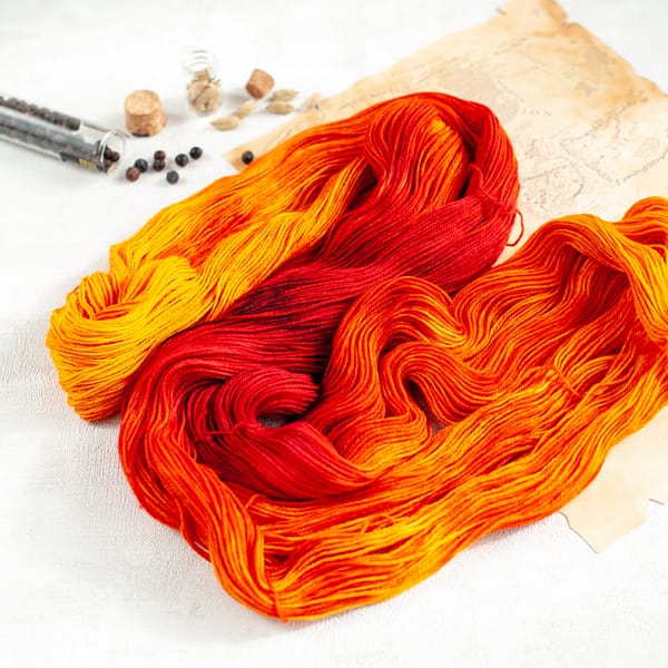an open skein of red, orange, and yellow yarn