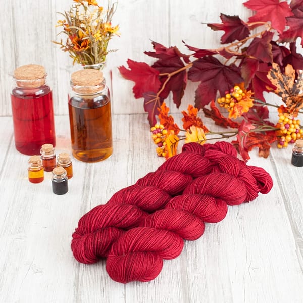 Two skeins of red yarn