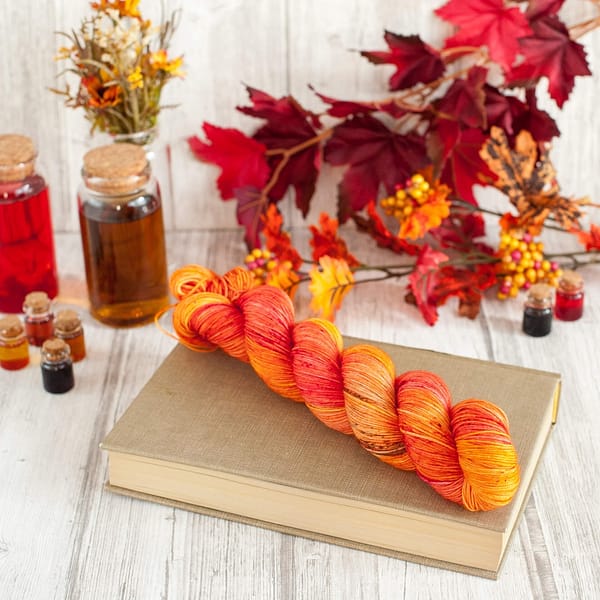 A red and orange skein of yarn