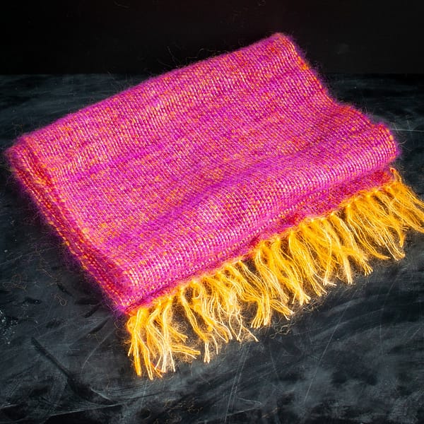 A folded mohair shawl