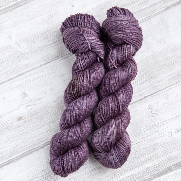 two skeins of yarn in the colorway 'Thistle'