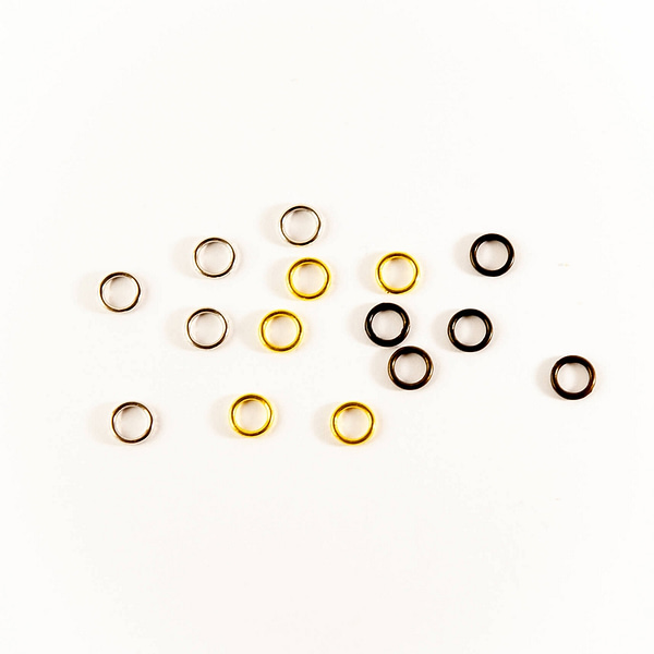eight circular metal stitch markers