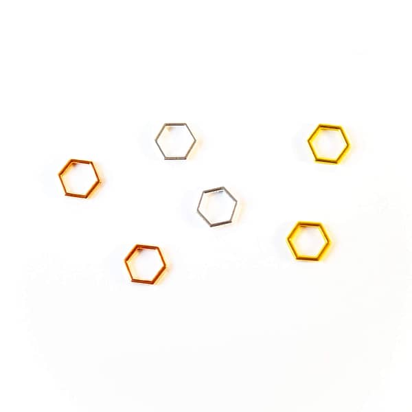 six honeycombed-stitch markers in gold, silver and rosegold