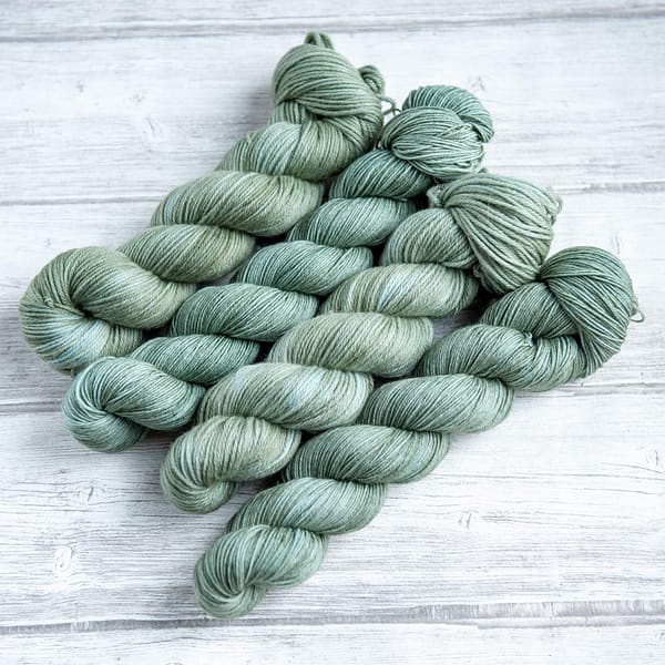 four skeins of yarn in the colorway 'Portree Harbour'